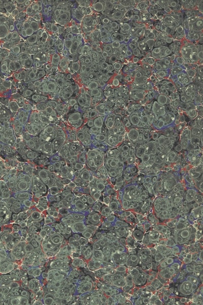 Stress Peak Reduction in Mycelium Composites Using Hybrid Models